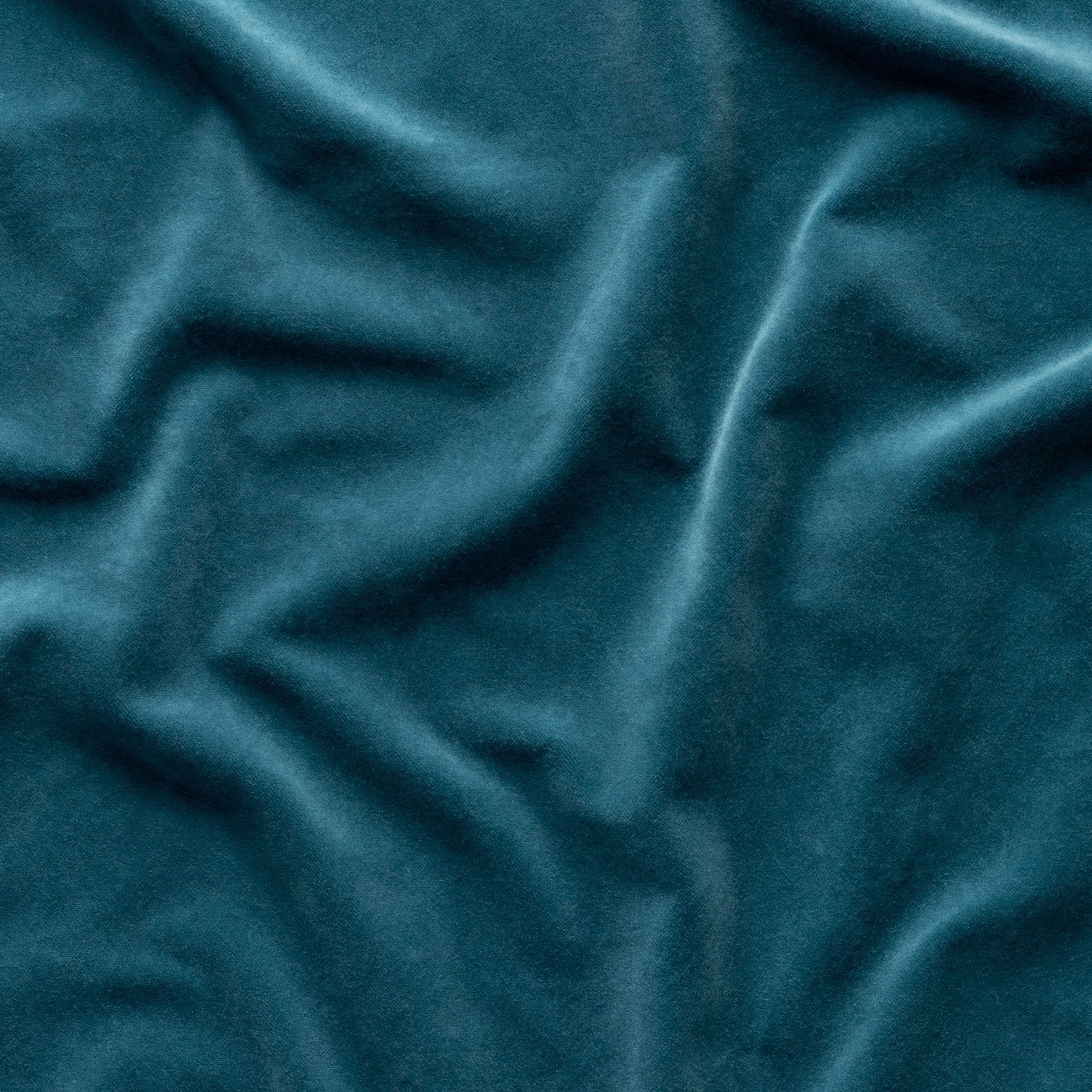 Cenote: A close up of cotton velvet in cenote, a vibrant, ocean-inspired blue-green.