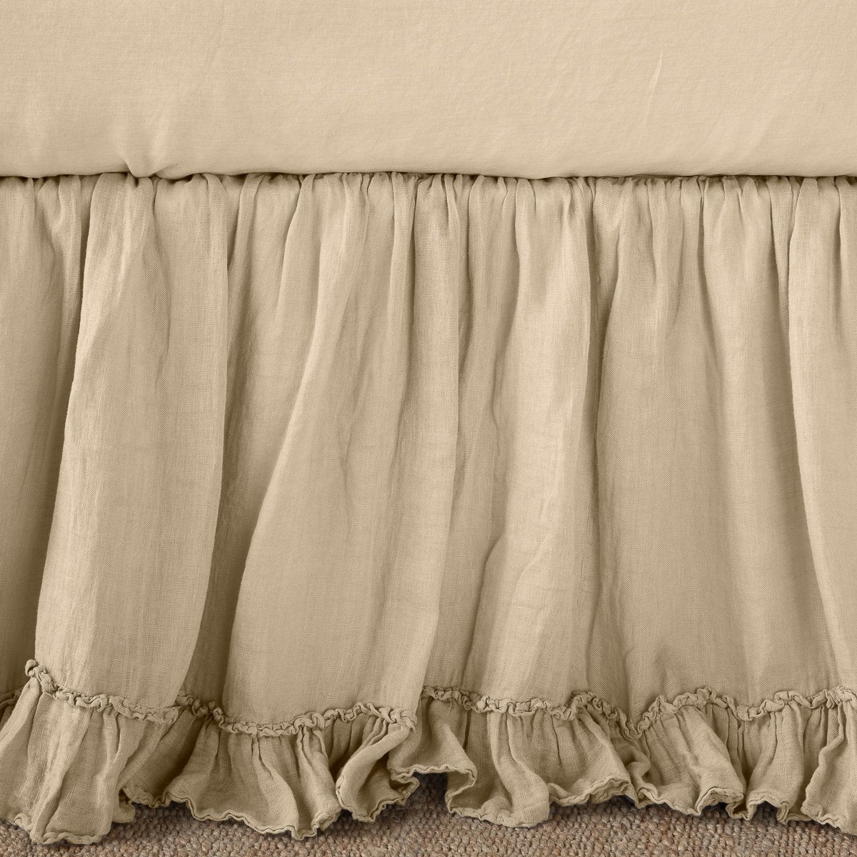 Honeycomb: Close up of bed skirt, showcasing ruffle detail - side view.