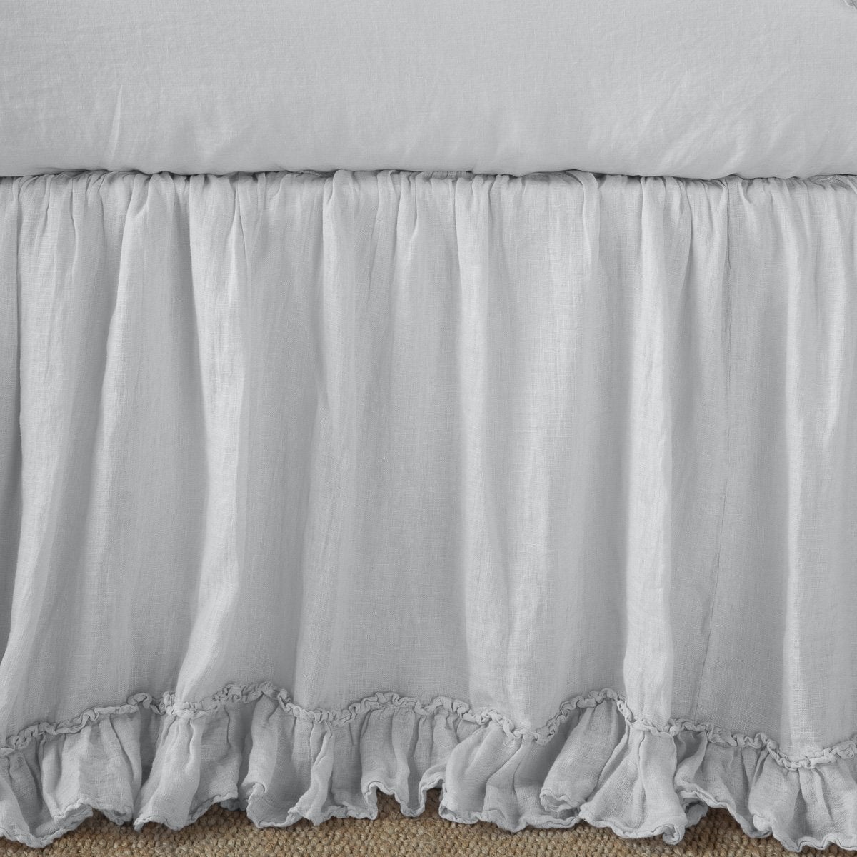 Sterling: Close up of bed skirt, showcasing ruffle detail - side view.
