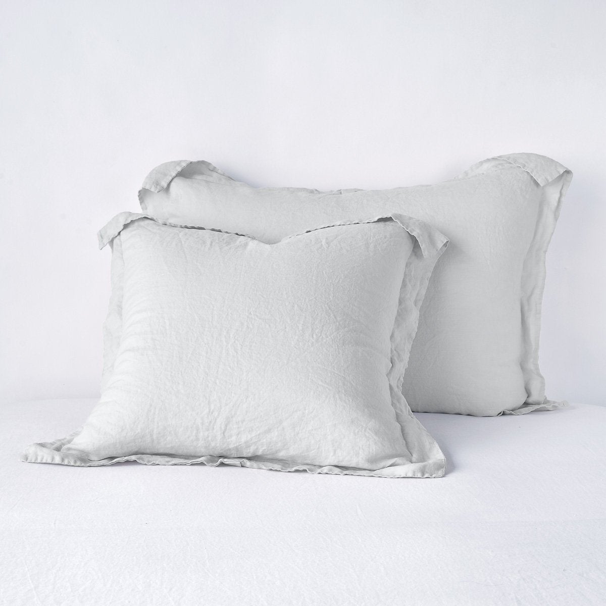 Sterling: Two shams leaning upright against a white background.