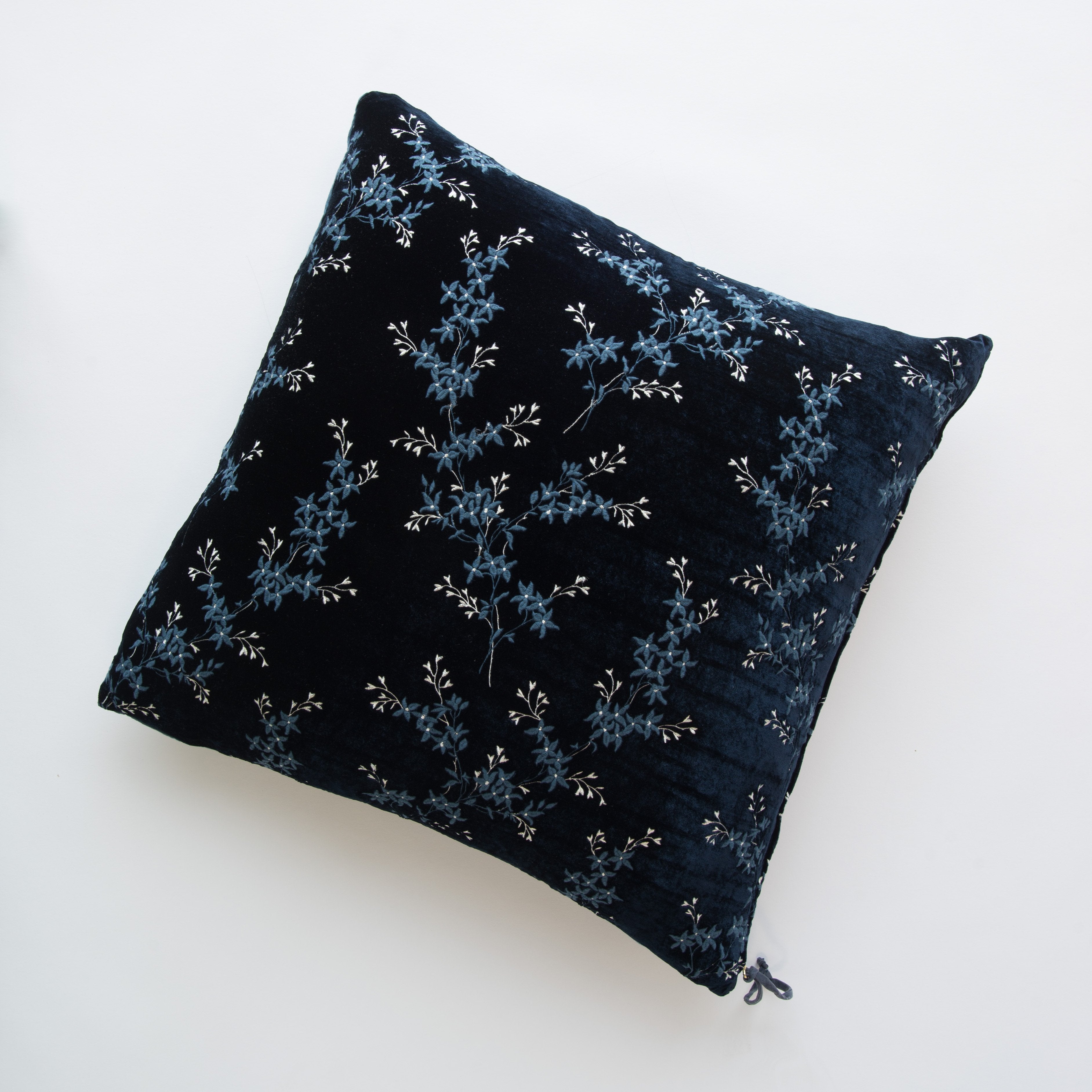 Midnight: pillow against a plain background - overhead view.