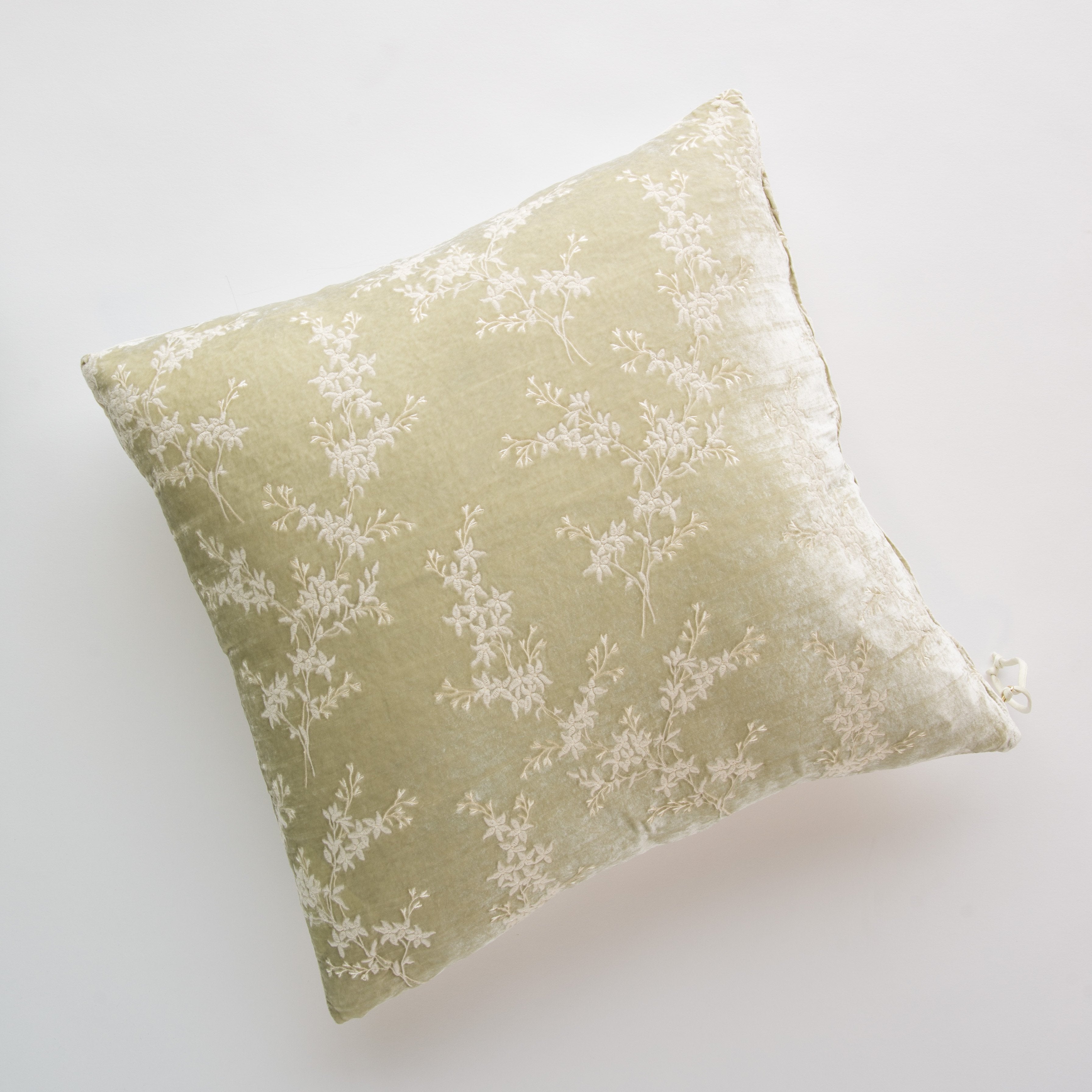 Parchment: pillow against a plain background - overhead view.