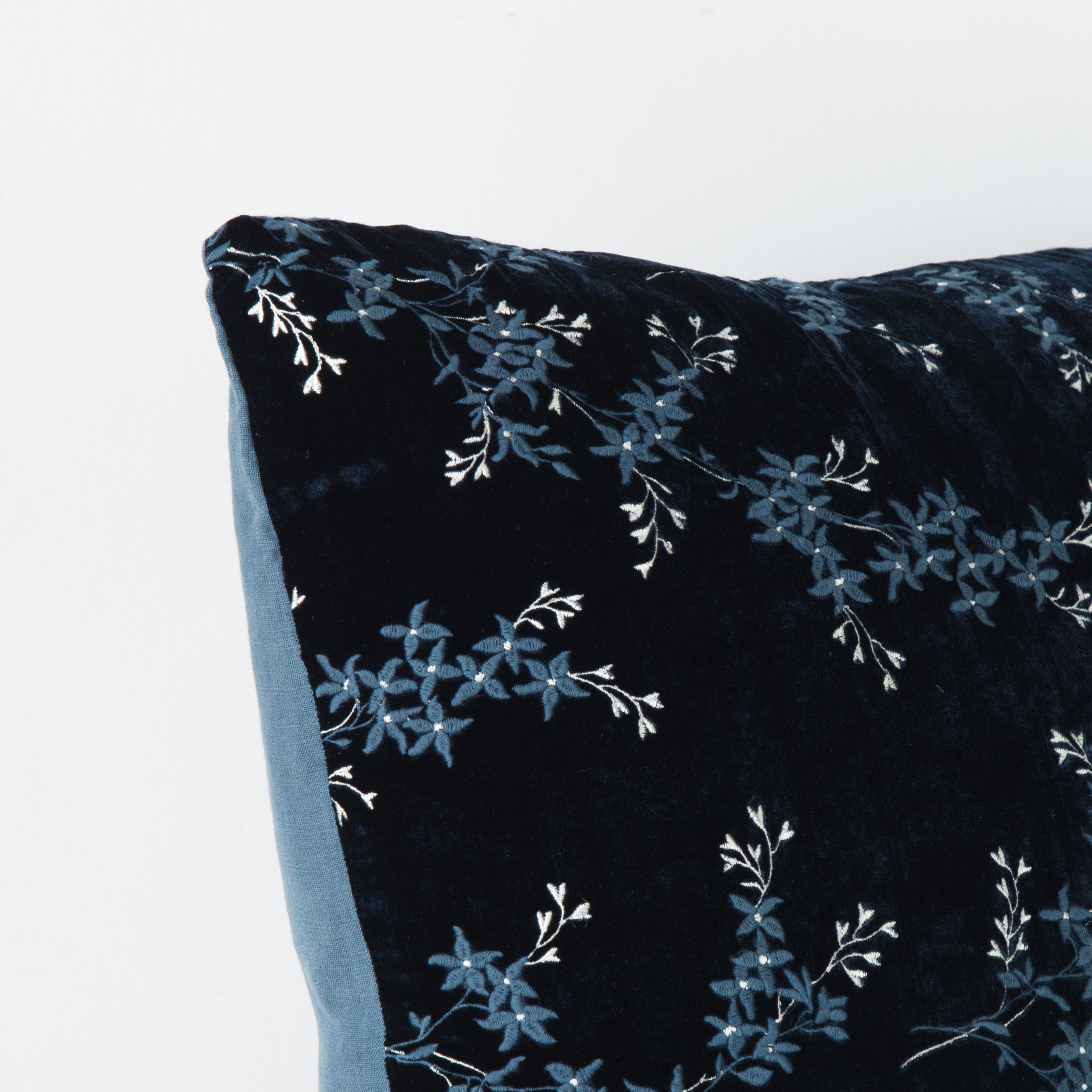 Midnight: Corner detail close-up, highlighting two-tone embroidery and linen back.