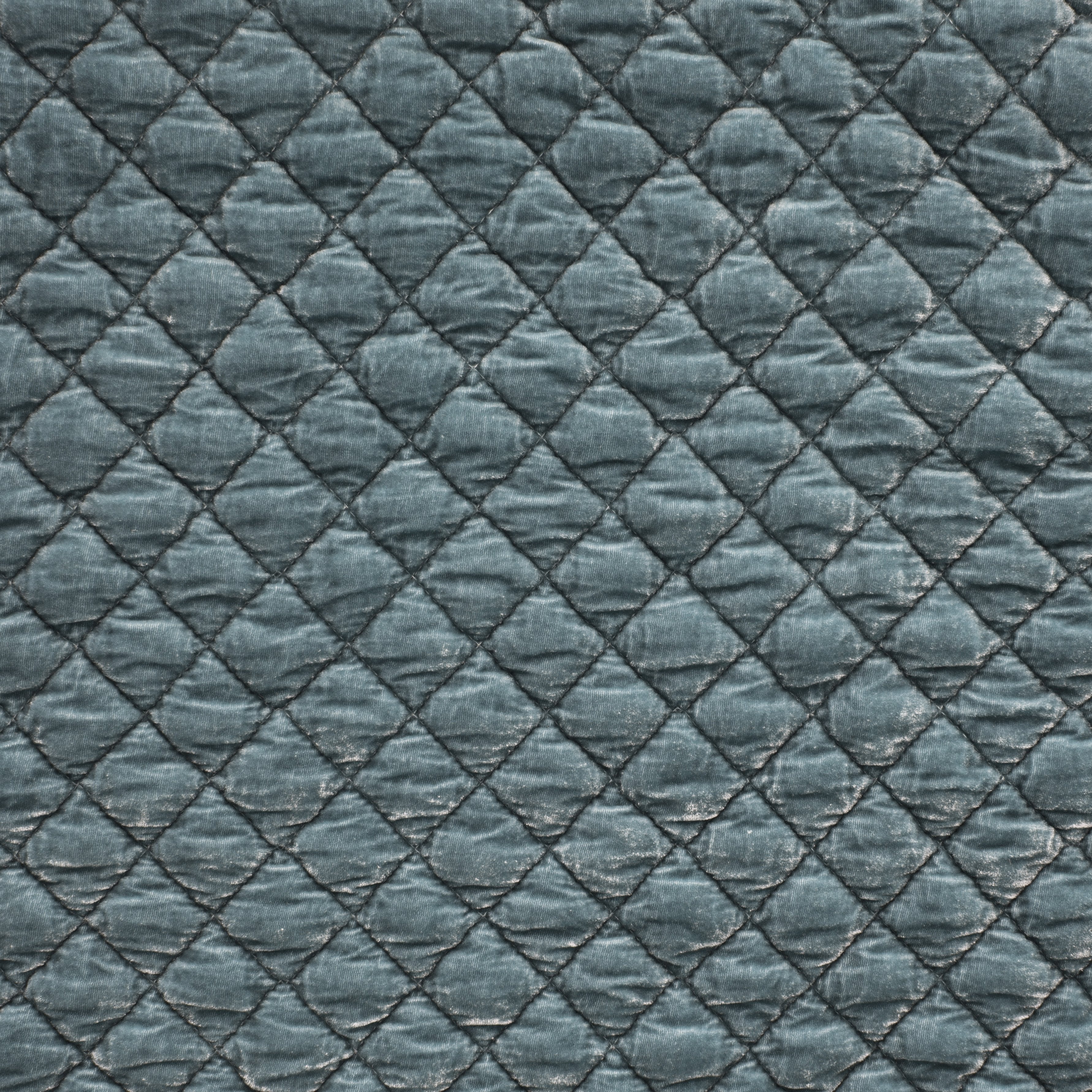 Cloud: Close-up of quilted silk velvet in cloud, a soft, subtle sky blue-grey. 