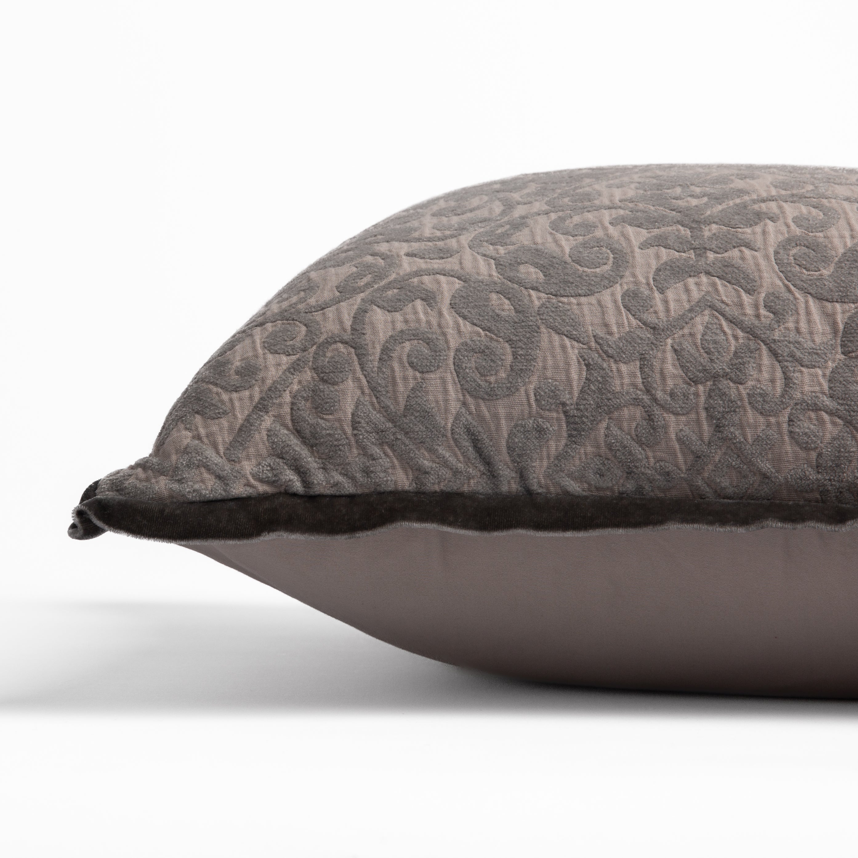 Fog: side view of 18x18 pillow shows cotton sateen back and silk velvet trim detail — close up against a white background. 