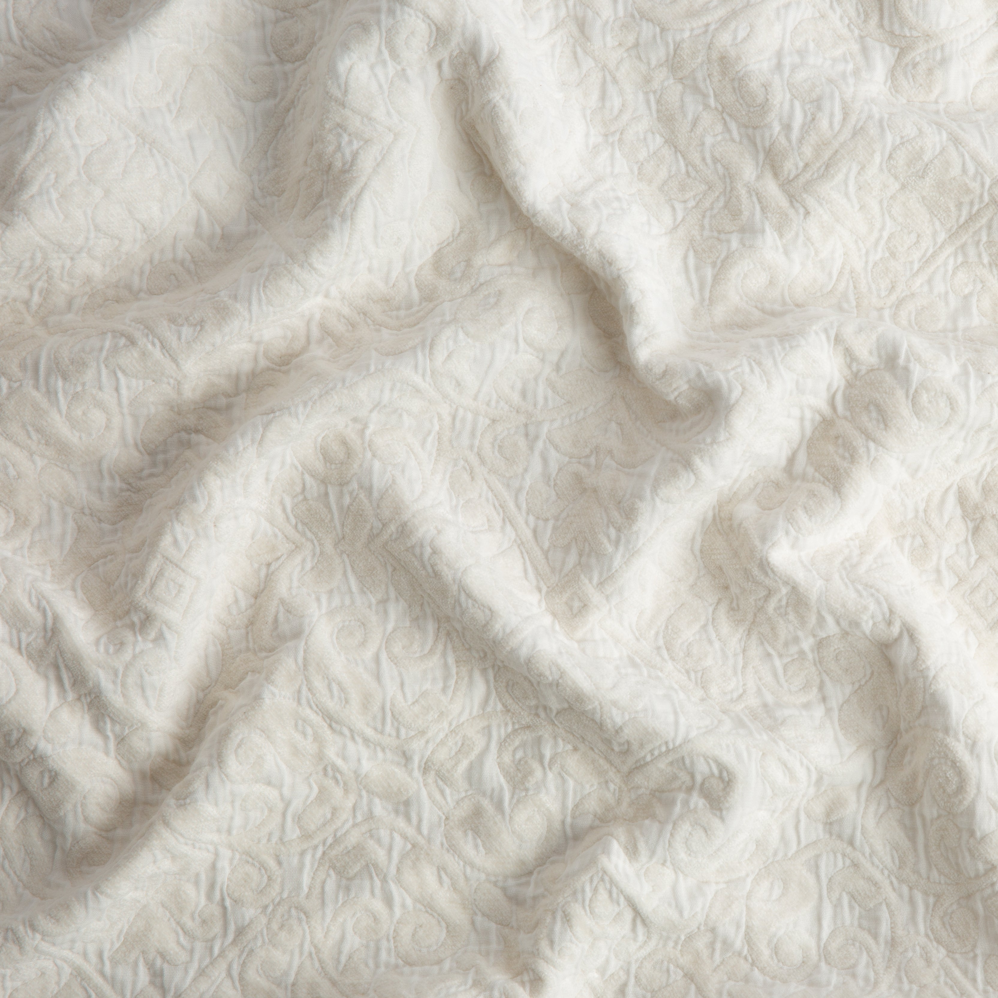 Winter White: A close up of Vienna cotton chenille jacquard in winter white, softer and warmer in tone than classic white. 
