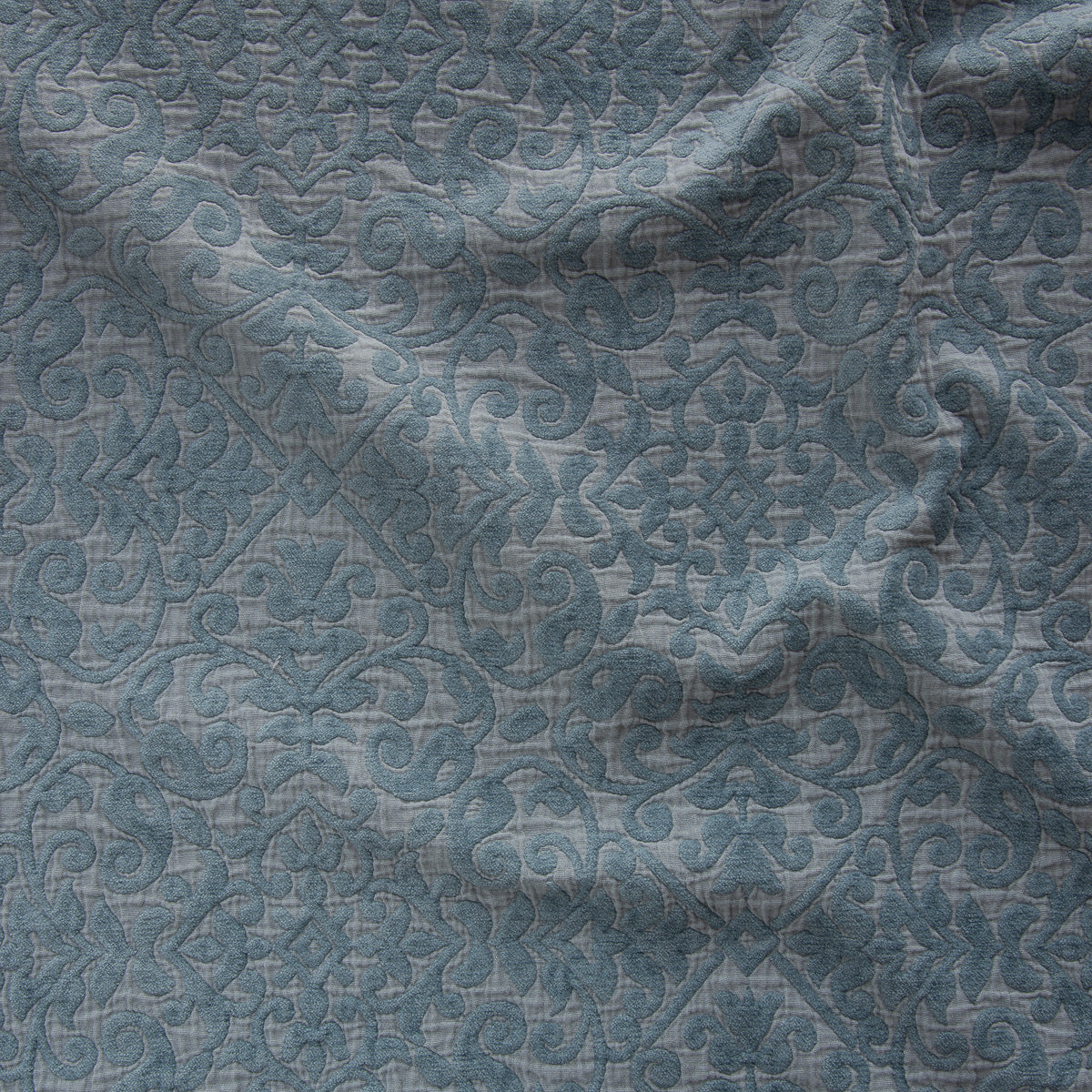 Mineral: A close up of Vienna cotton chenille jacquard in mineral, a soothing seafoam blue with subtle grey-green undertones. 