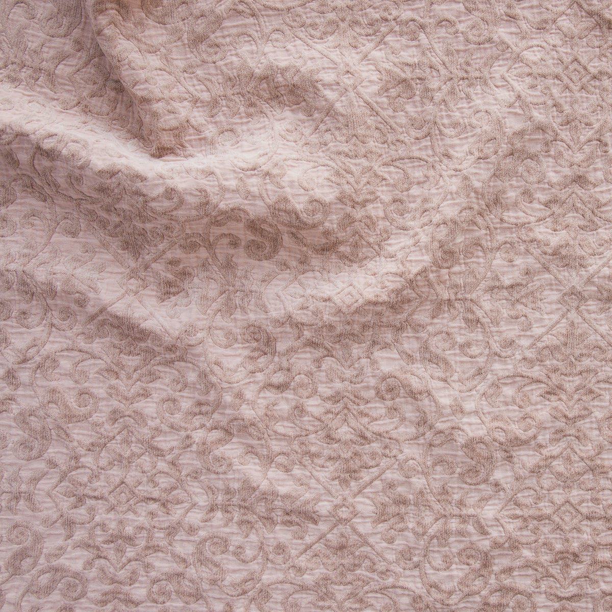 Rouge: A close up of Vienna cotton chenille jacquard in rouge, a mid-tone blush pink. 